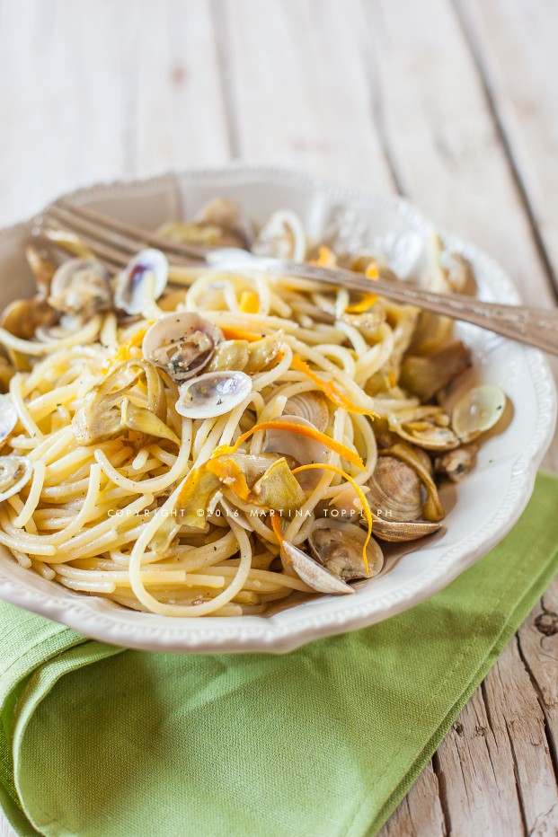 Spaghetti con carciofi e vongole all'arancia